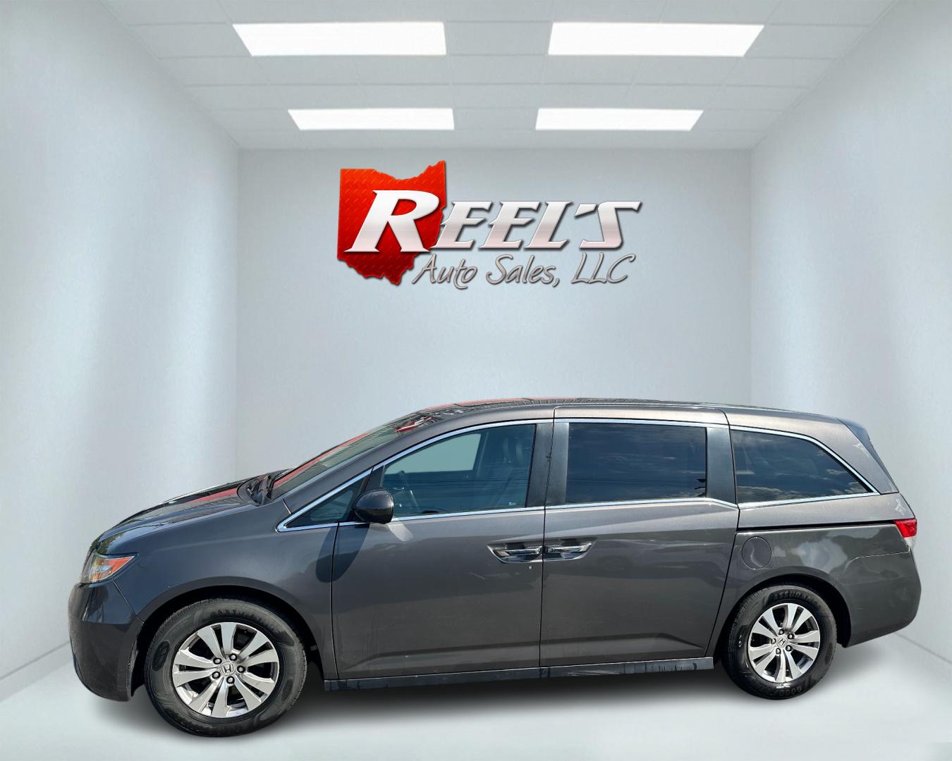 2015 Gray /Grey Honda Odyssey EX-L (5FNRL5H67FB) with an 3.5L V6 SOHC 24V engine, 6-Speed Automatic transmission, located at 547 E. Main St., Orwell, OH, 44076, (440) 437-5893, 41.535435, -80.847855 - Photo#10